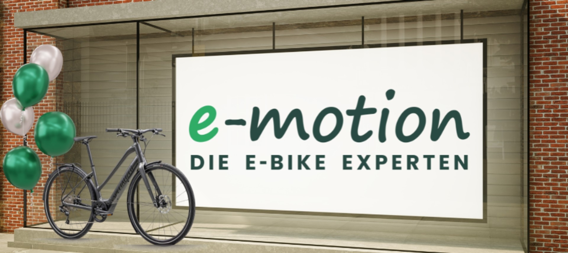 Das Bild zeigt auf einer großen Leinwand e-motion DIE E-BIKE EXPERTEN mit einem e-Bike und Luftballons links.