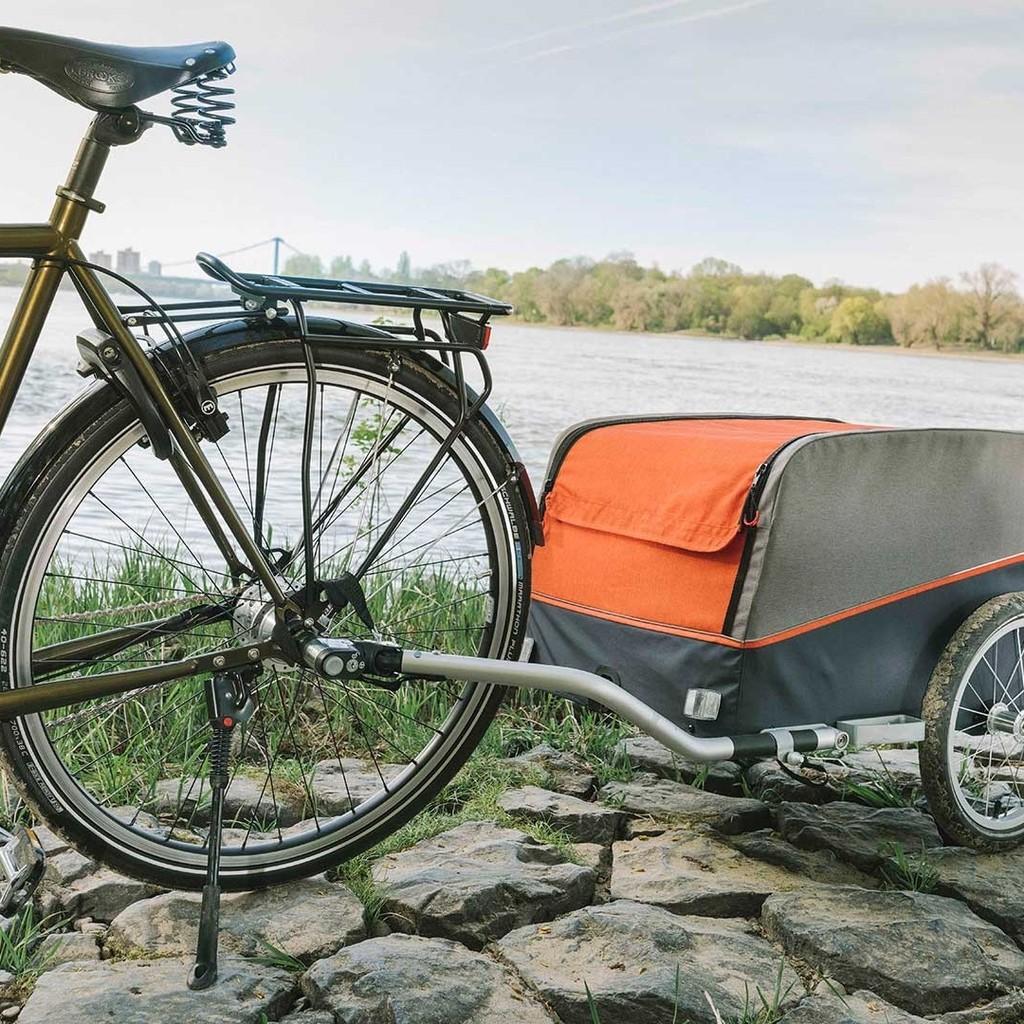 Entdecke den Croozer Cargo Anhänger – ideal für Camping, Einkäufe & Picknick. Einfach am Fahrrad anhängen und komfo