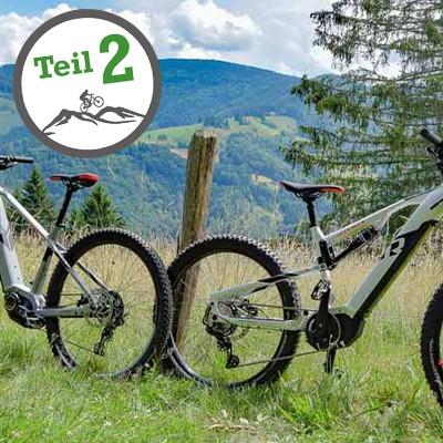 Entdecke zwei R Raymon E-Bikes in malerischer Landschaft. Optimiere dein Fahrerlebnis mit diesen leistungsstarken M