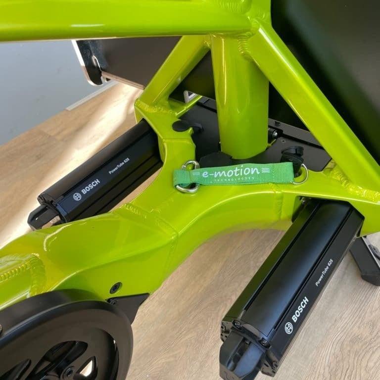 Grünes E-Bike mit Bosch-Akkus und e-motion Branding