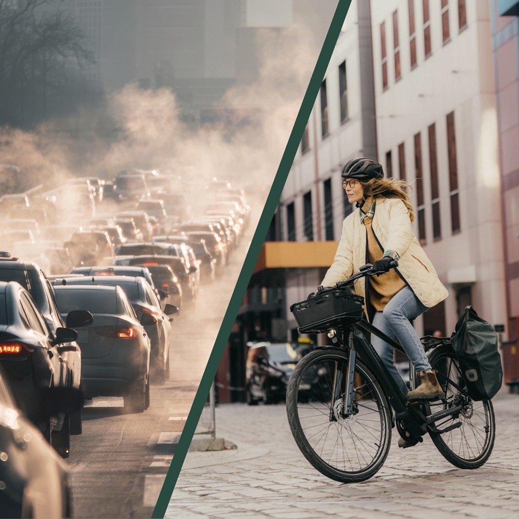 Auf der linken Seite ein Stau mit Autos, rechts ein Frau auf dem e-Bike